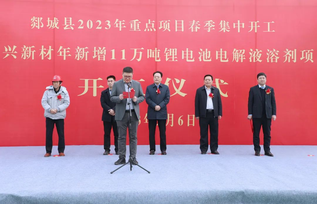 A representative speaking at the groundbreaking ceremony